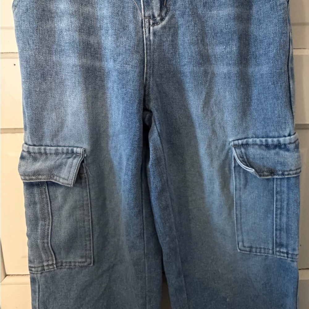 Boy’s light wash denim jeans.  Elastic waist band.  Unbranded.  Size 11Y